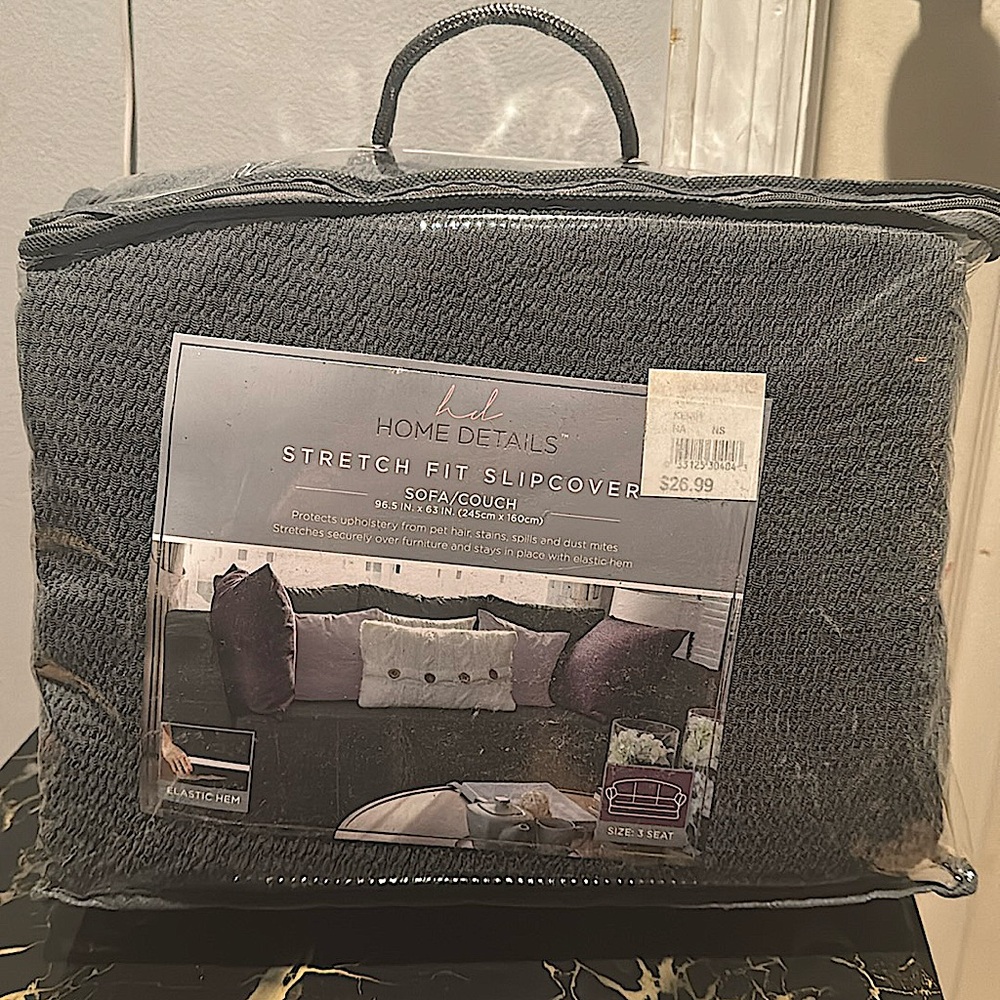 Couch/sofa slipcover, stretchfit with elastic hem. 96.5 in x 63 in. unopened.